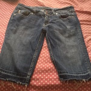 A pair of jean cut offs